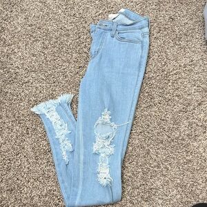 Vibrant Light Blue Ripped Skinny Jeans